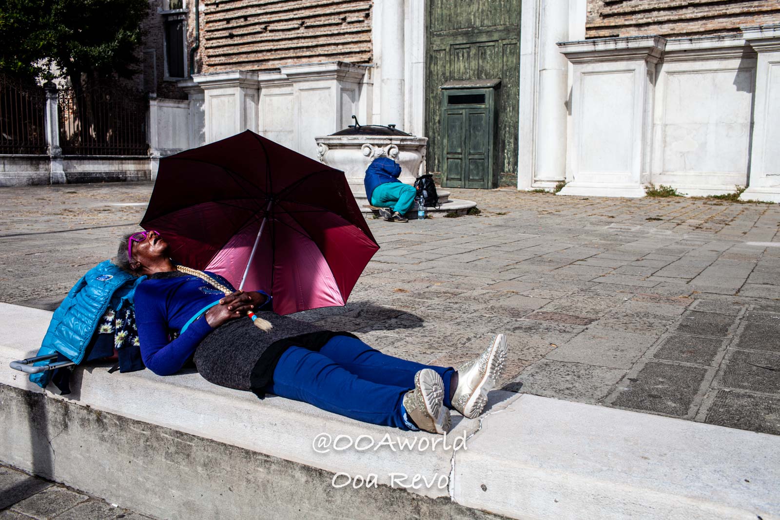 Venice Italy woman relaxing with umbrella in Venice Photo OOAworld