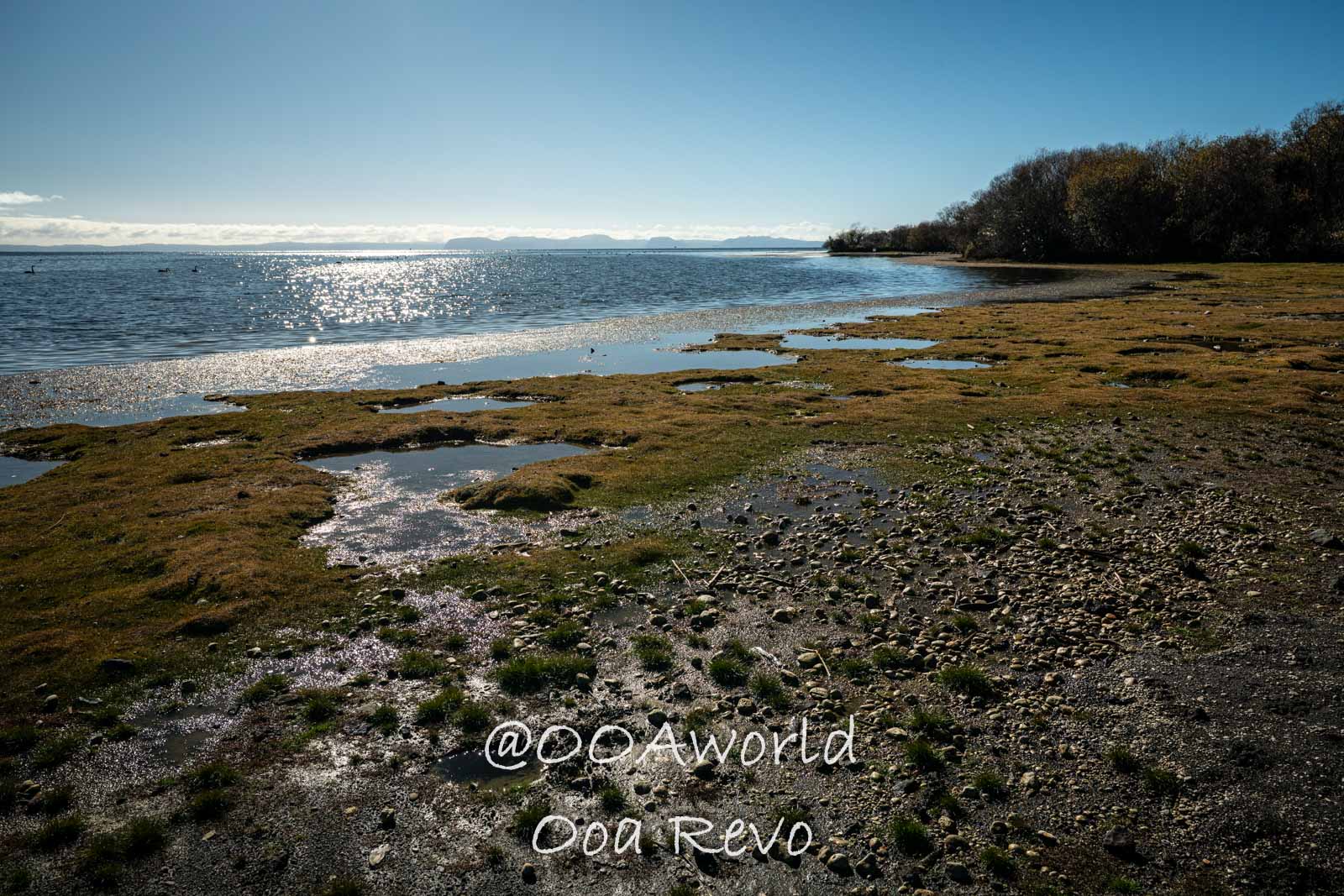 Wellington, Martinborough to Huka Falls New Zealand coastal shoreline with sparkling water Photo OOAworld