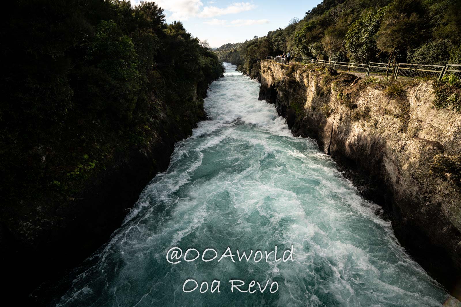 Wellington, Martinborough to Huka Falls New Zealand Scenic river gorge with fast flowing water and forested banks Photo OOAworld