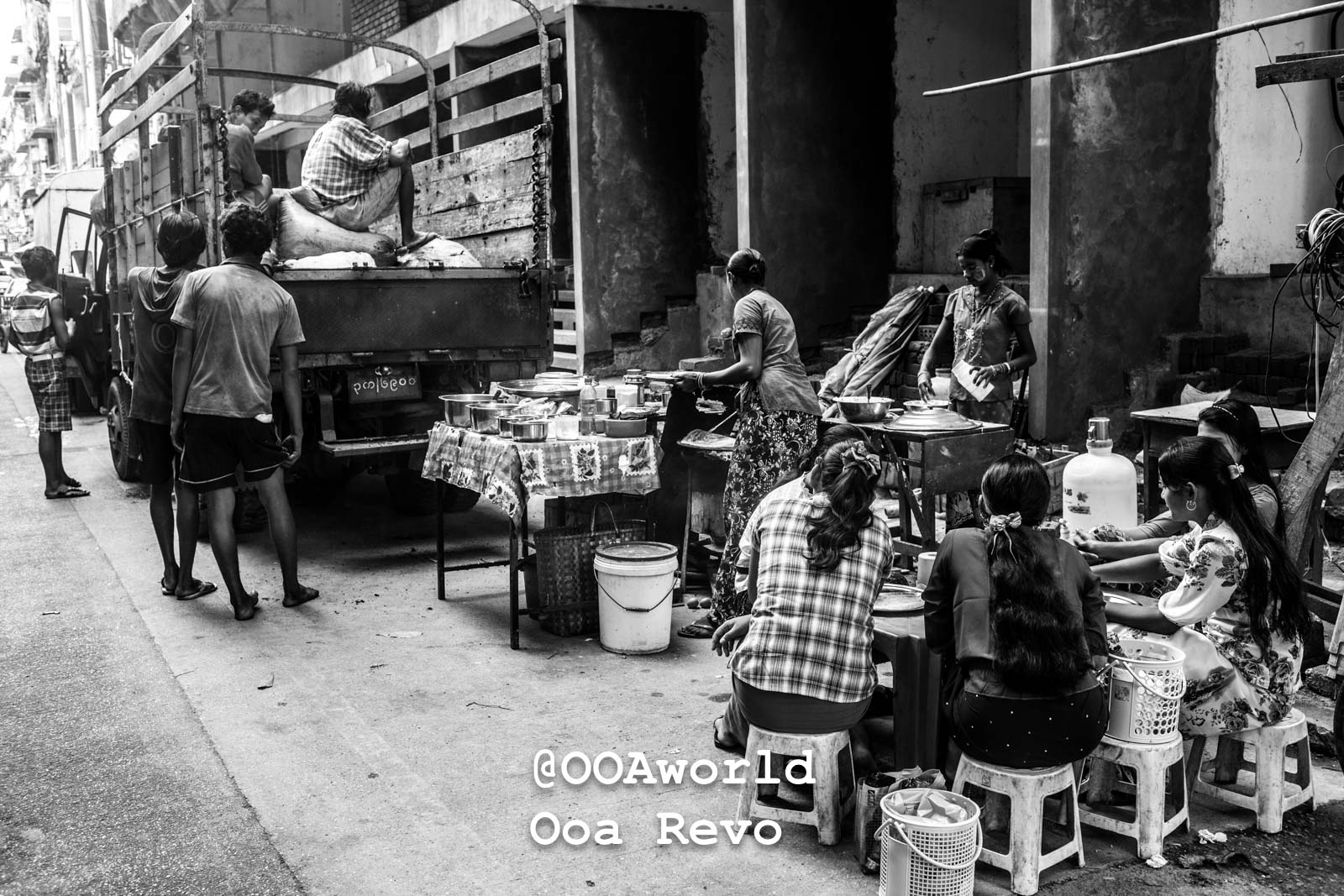 Yangon People and Streets Yangon black and white street market scene with people and truck Photo OOAworld