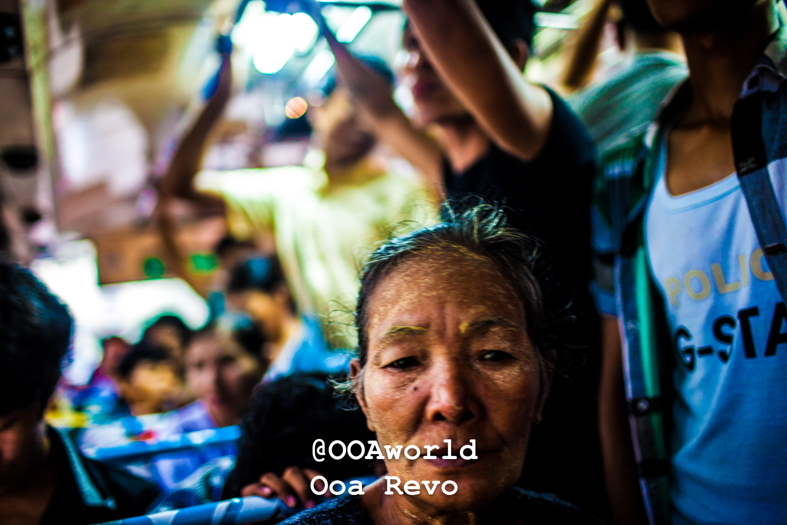Yangon People and Streets Yangon Elderly woman on a crowded bus in Asia Photo OOAworld