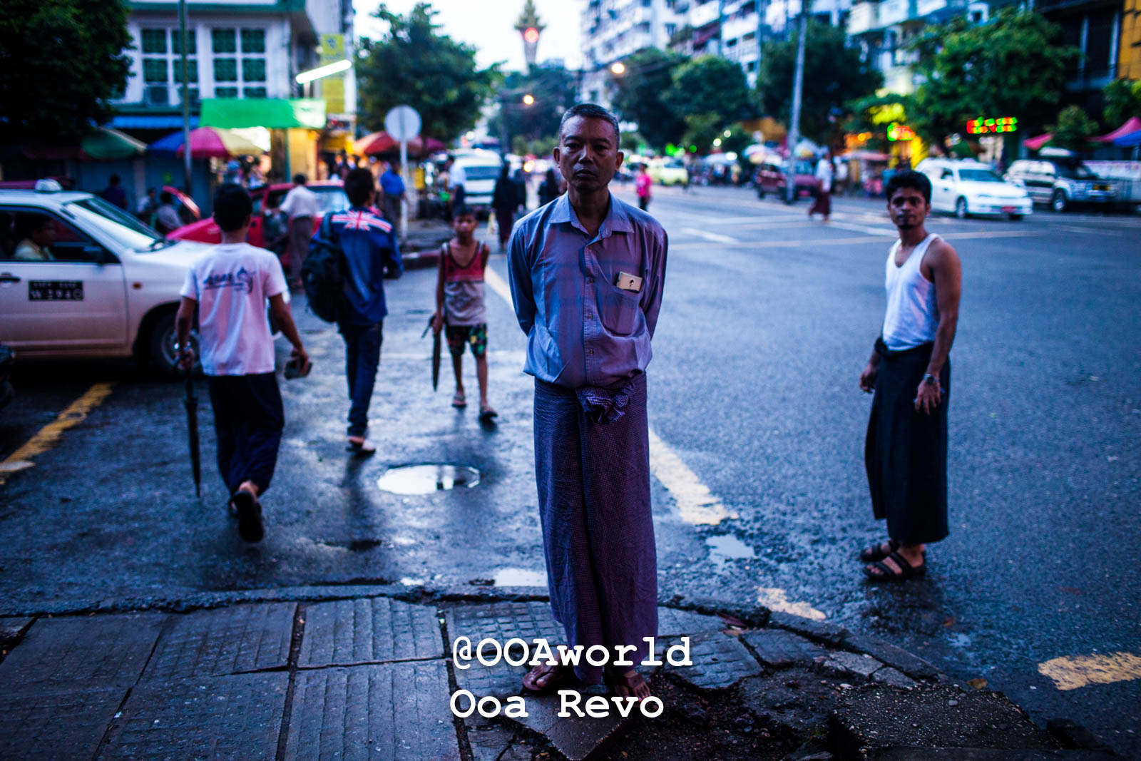 evening street scene Yangon Myanmar urban life Photo OOAworld