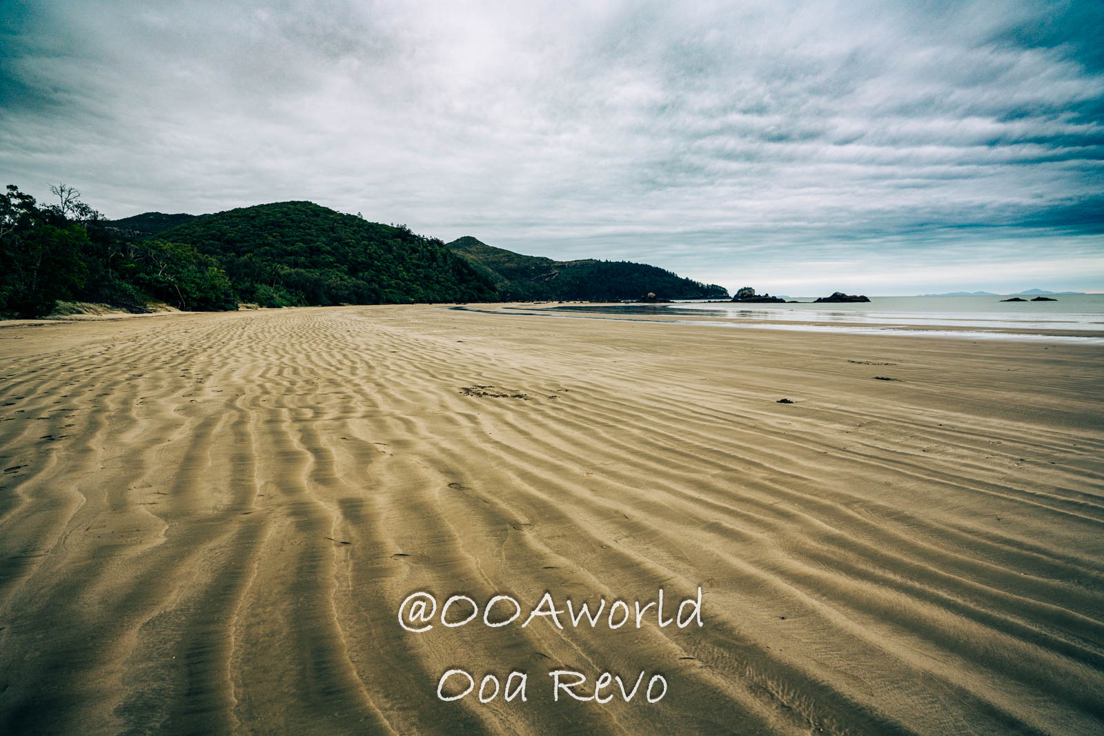 Cape Hillsborough Australia expansive sandy beach under cloudy sky Photo OOAworld Cape Hillsborough Australia expansive sandy beach under cloudy sky Photo OOAworld