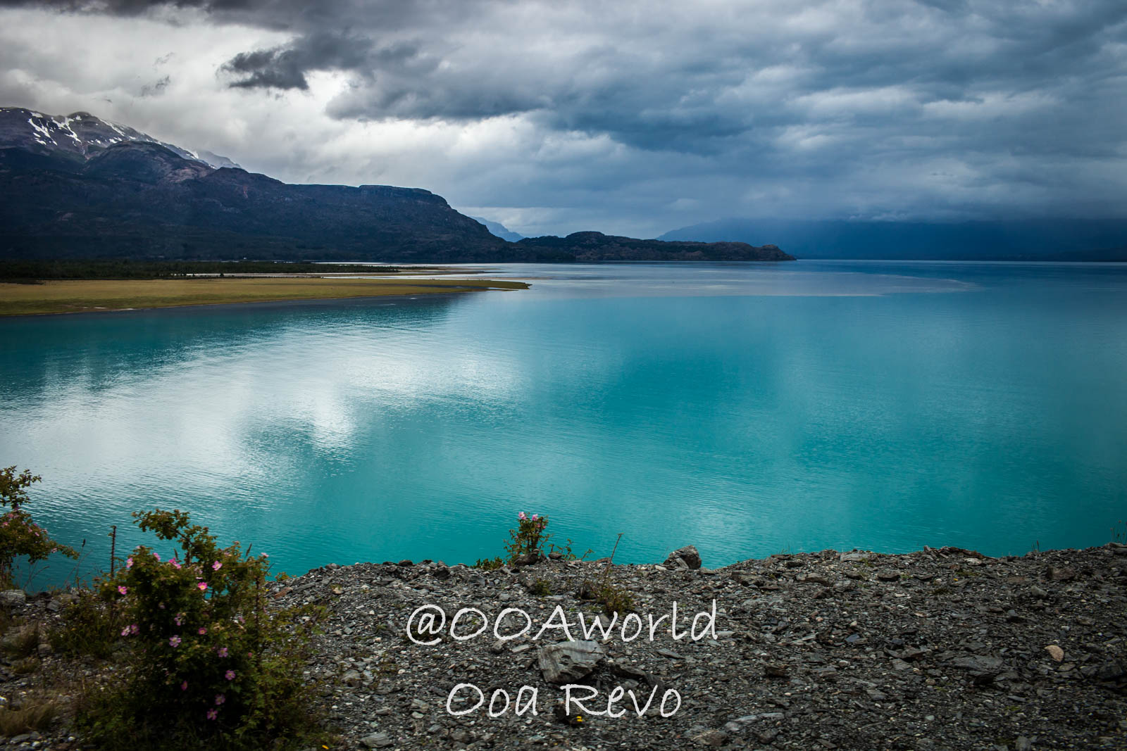 Bus Chile Chico to Puerto Rio Tranquilo Landscapes Chile Chico Patagonian fjord landscape with turquoise water and cloudy sky Photo OOAworld