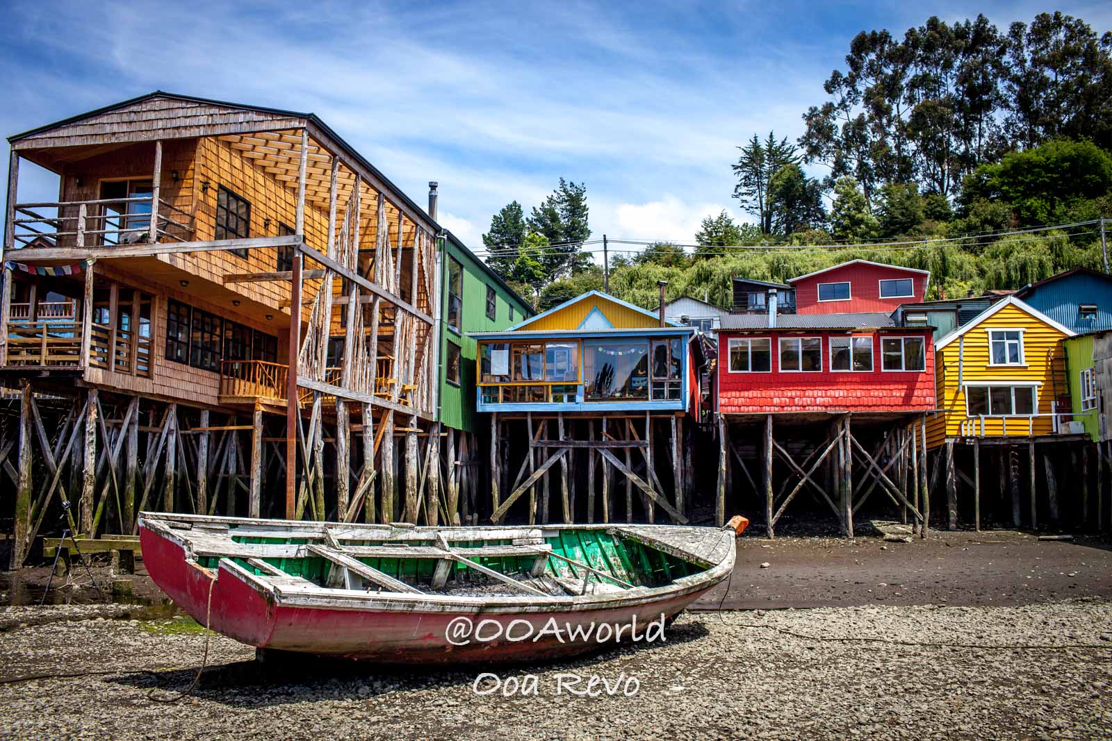 Palafitos and NYE Chiloe colorful palafitos and boat Chiloé Island Photo OOAworld