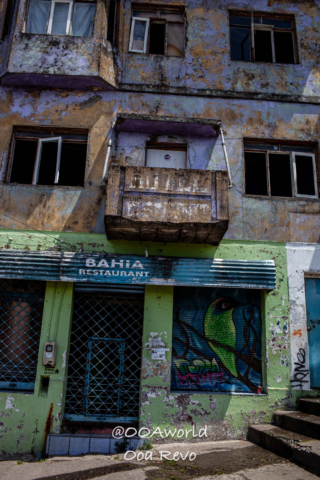 Palafitos and NYE Chiloe dilapidated building Bahia restaurant graffiti Photo OOAworld