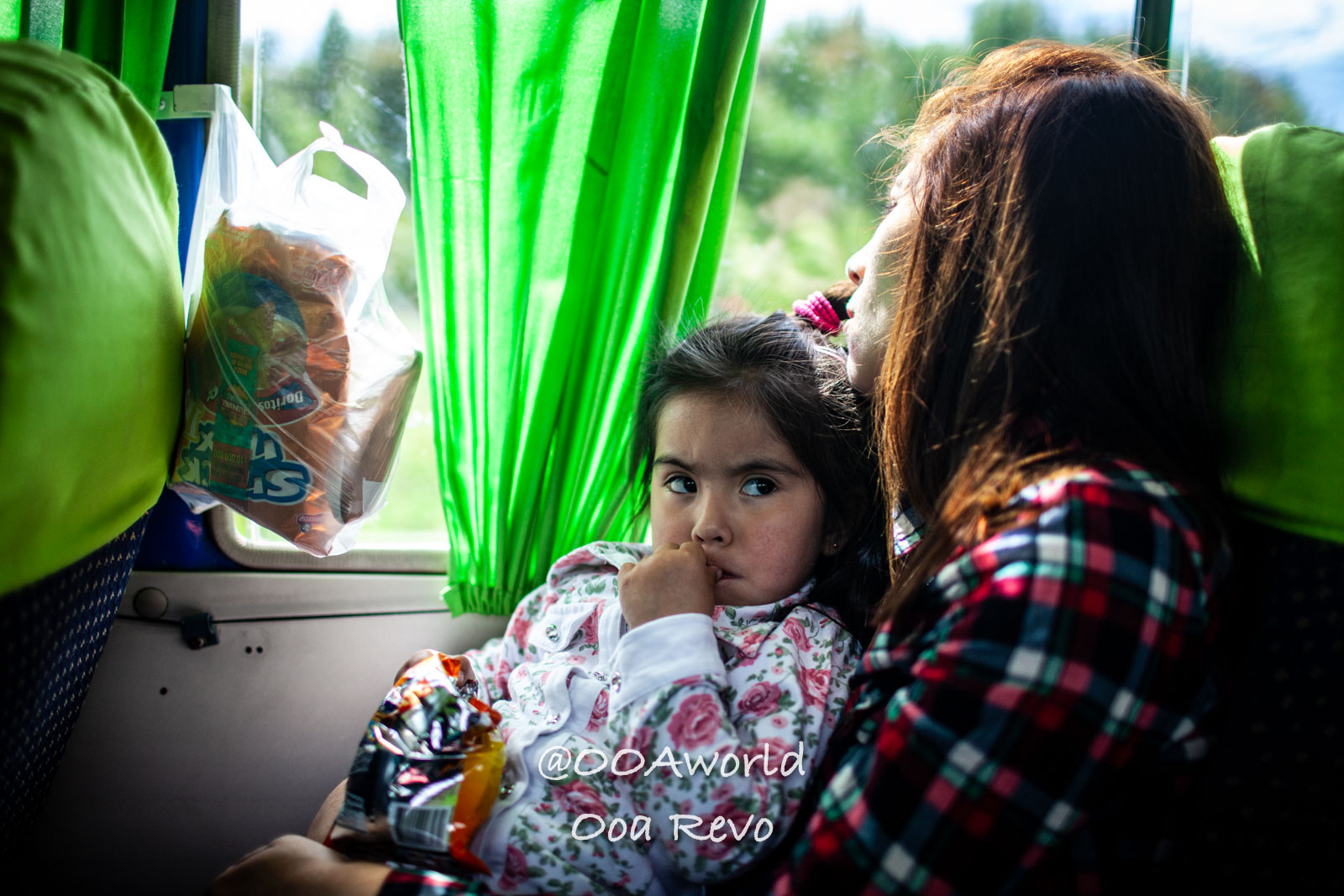 Castro Street Photography Chiloe mother and child traveling on bus Photo OOAworld
