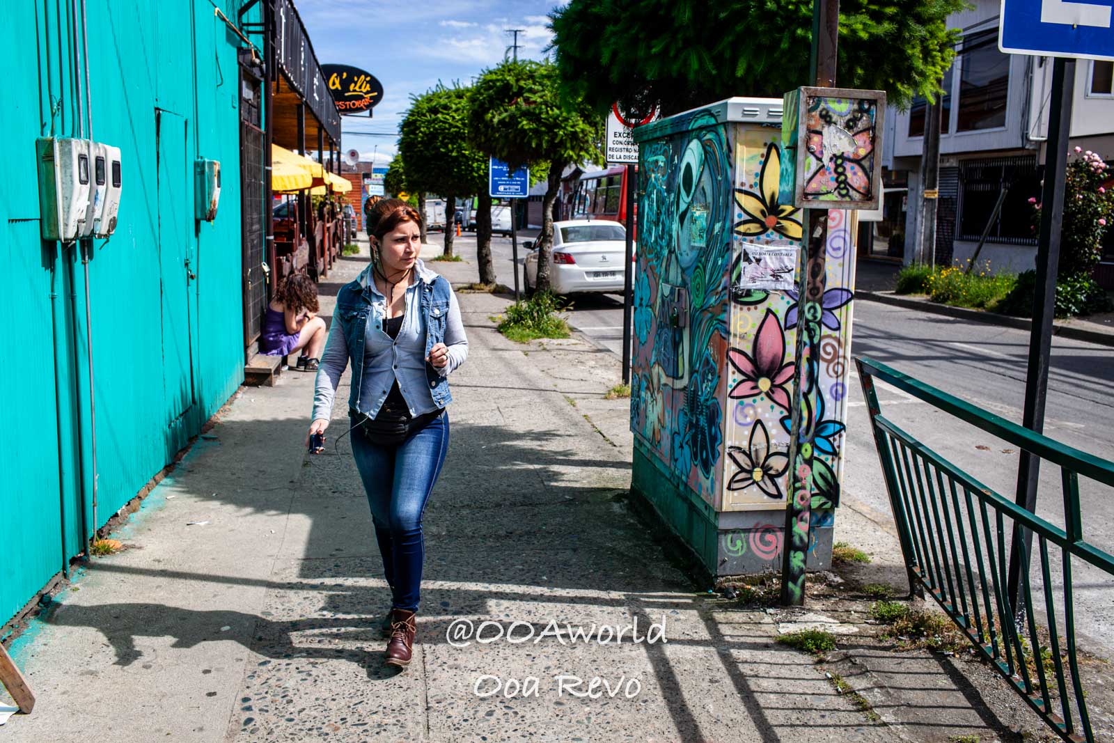 Castro Street Photography Chiloe woman walking on colorful urban street Photo OOAworld