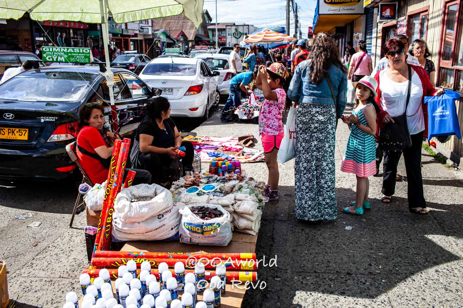 Castro Street Photography Chiloe busy street market with vendors and shoppers Photo OOAworld