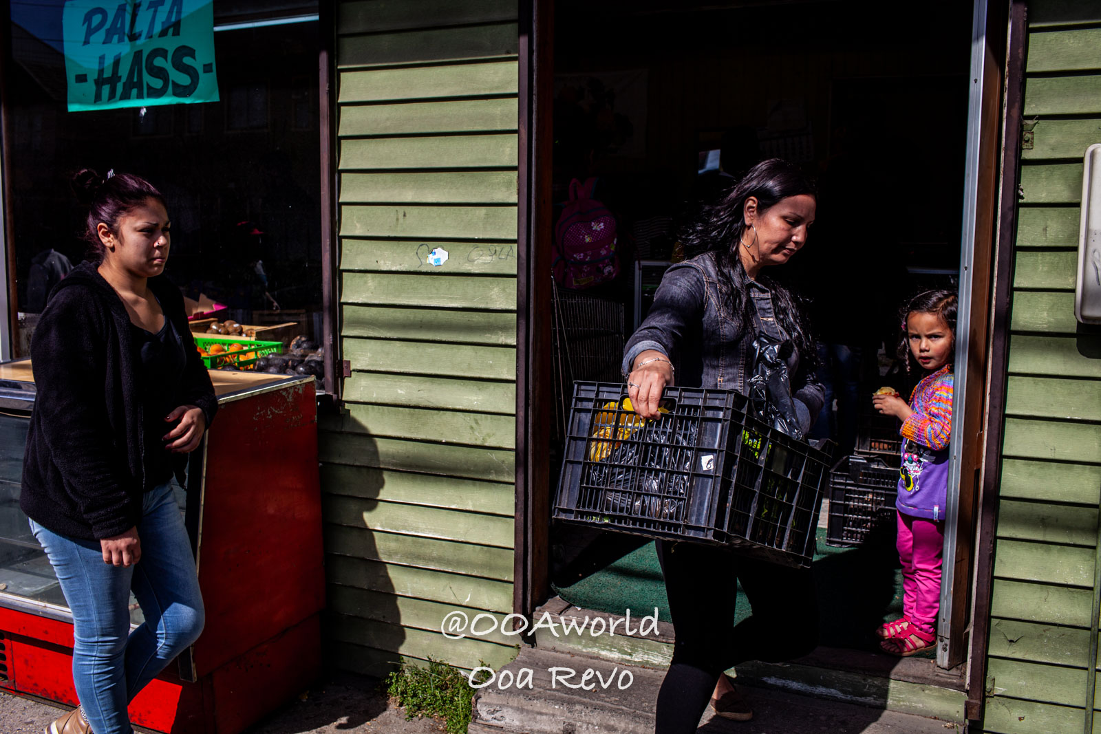 Castro Street Photography Chiloe local market scene with women and child Photo OOAworld