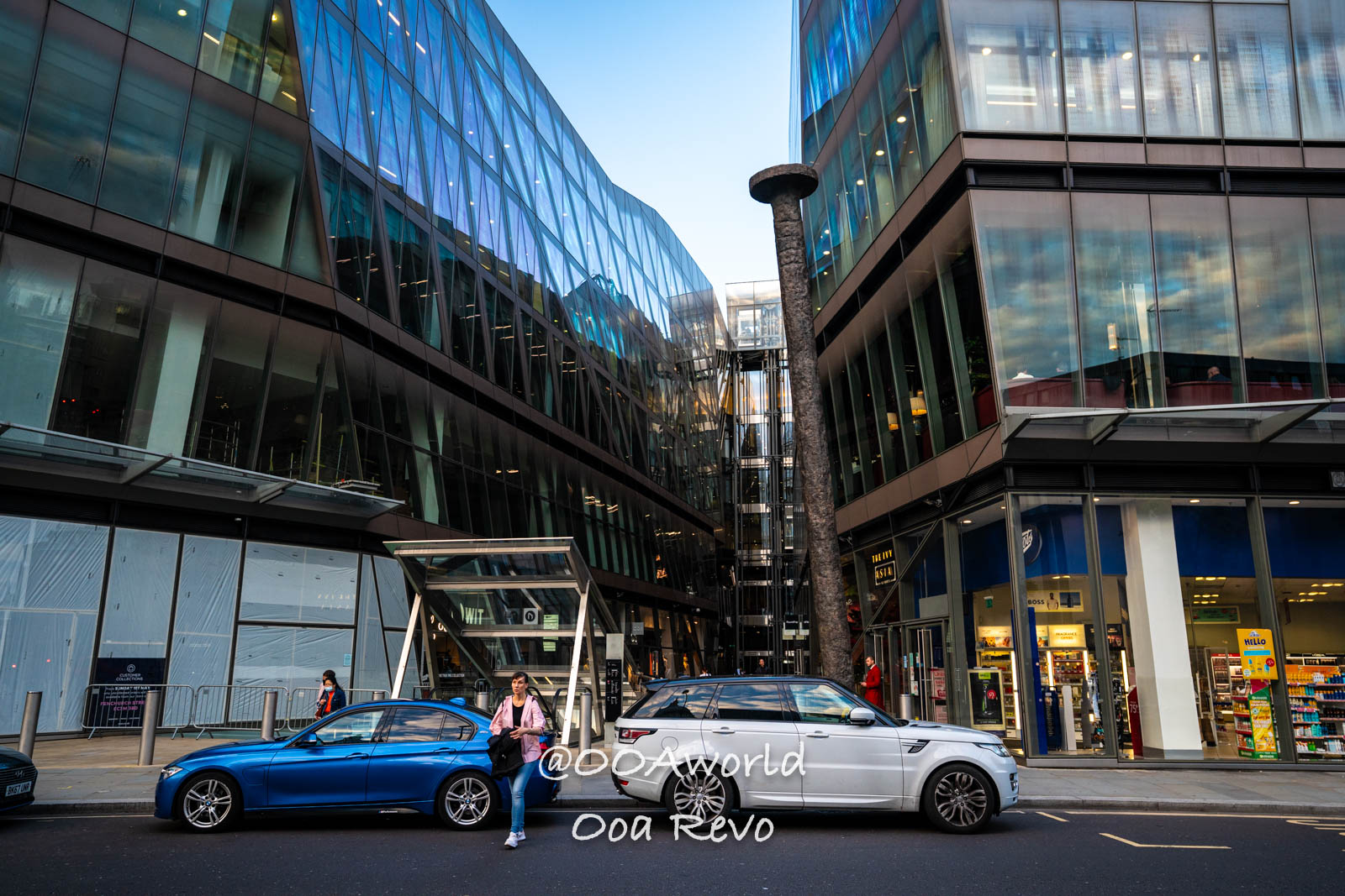 modern glass buildings with cars London cityscape Photo OOAworld