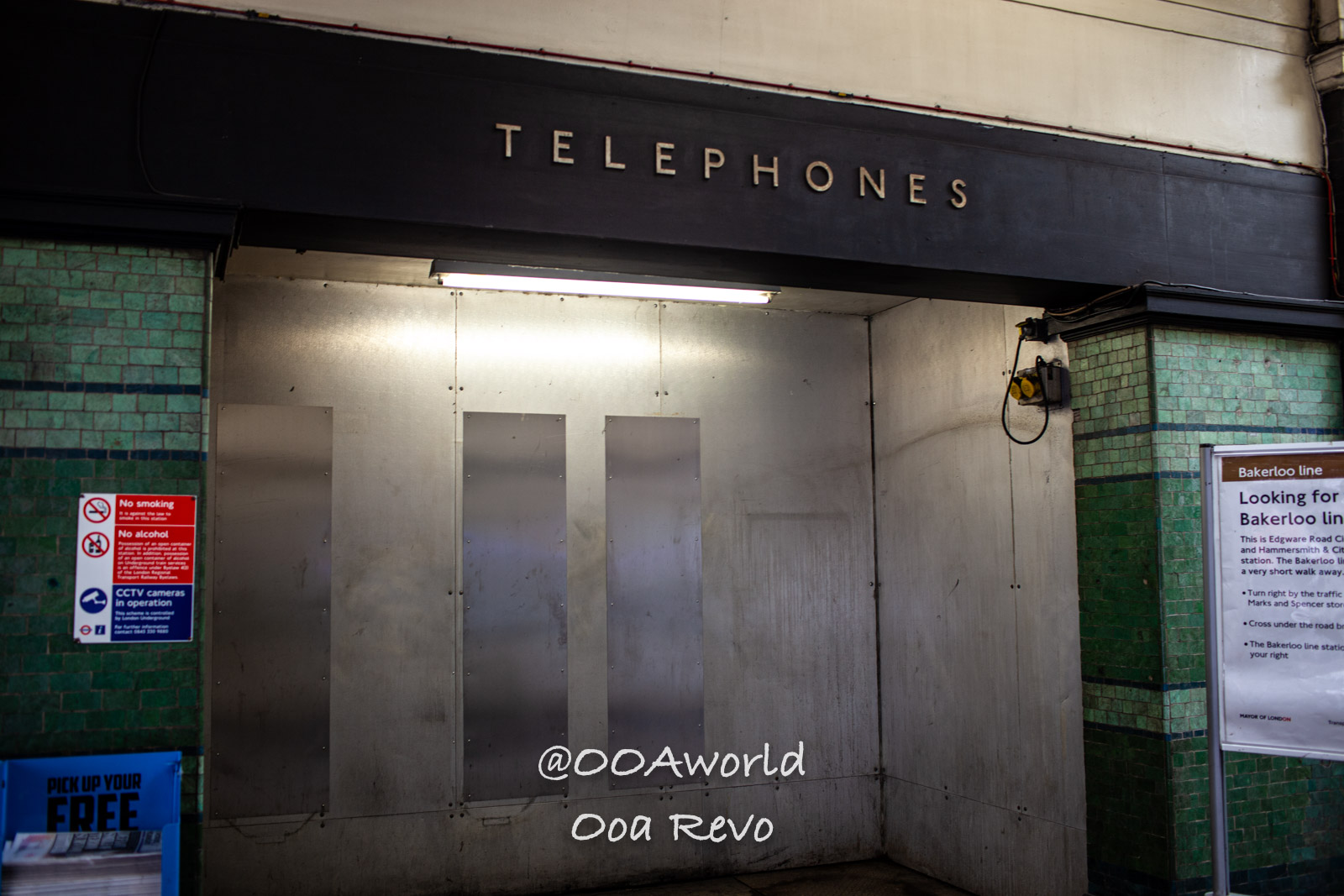 abandoned telephone booth London underground Photo OOAworld