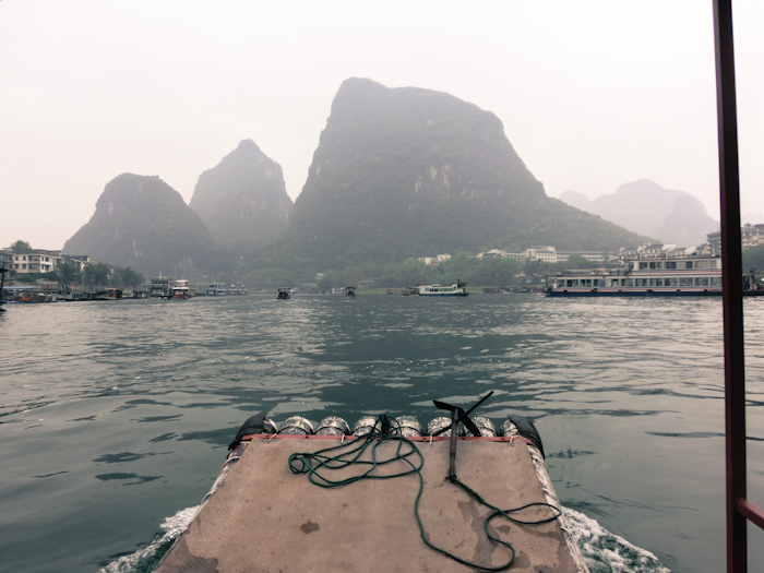 boat tour yangshuo china photo ooaworld Rolling Coconut