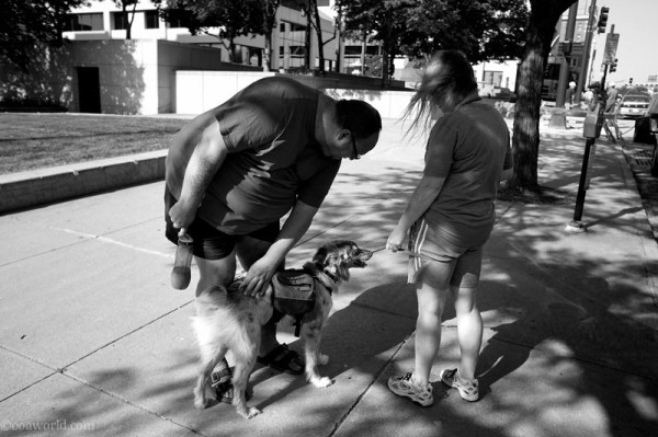 Omaha, Nebraska, playing with dogs