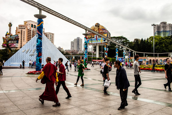 Buddhist monks walk in front of Shenzhen's Window of the World theme park.