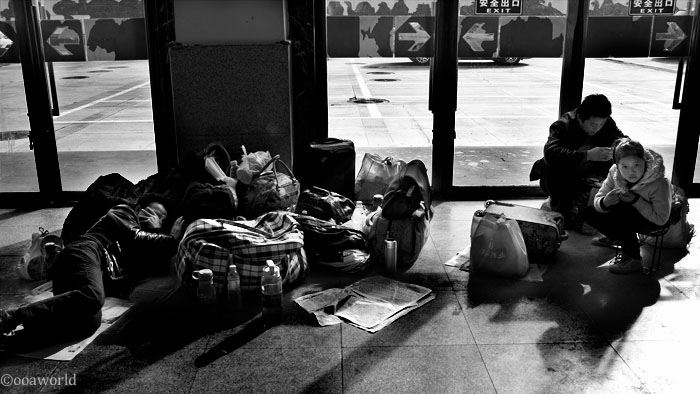 waiting for a train in china photo ooaworld